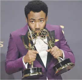  ?? Atlanta. Pictures: AFP ?? DOUBLING UP: Donald Glover wins two awards for directing and starring in the comedy series