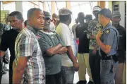  ?? Picture: EUGENE COETZEE ?? HAD ENOUGH: Residents gather after closing Helenvale ward councillor Pieter Hermaans’s offices at the Helenvale resource centre