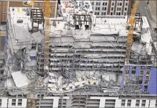  ?? Gerald Herbert / Associated Press ?? This aerial photo shows the Hard Rock Hotel, which was under constructi­on, after a fatal partial collapse in New Orleans on Saturday.