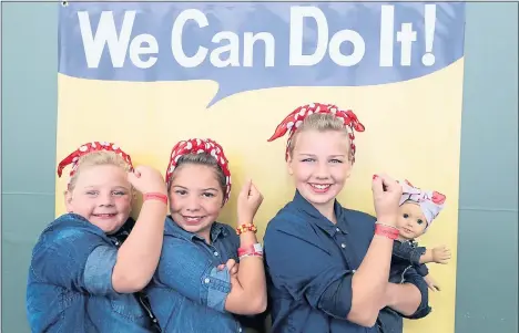  ?? STAFF FILE PHOTO ?? Sisters Liv, Leila and Larissa Gorton of Reno, Nev., pose dressed as Rosie the Riveter at the Rosie Rally Home Front Festival in 2017. The event celebratin­g the World War II era and the female icon returns to Craneway Pavilion in Richmond on Saturday.