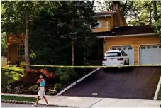  ??  ?? Crime scene: Police tape across driveway yesterday