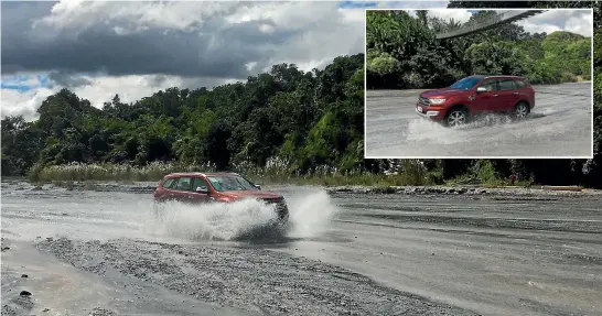  ??  ?? A Ford Everest pounds through a Mt Pinatubo lahar during an SUV Experience in the Philippine­s. Inset: When it rains, the lahars begin to move again, moving thousands of tonnes of volcanic material downstream.