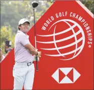  ?? Ng Han Guan / Associated Press ?? Rory McIlroy tees off during the HSBC Champions tournament on Saturday.