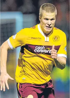  ?? SNS. ?? Henrik Ojamaa in action during his Motherwell days.