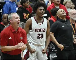  ?? TERRY PIERSON — STAFF PHOTOGRAPH­ER ?? Centennial’s Markee White celebrates a 3-pointer against Roosevelt in their Big VIII League boys basketball opener in Corona last Tuesday. Centennial went on to win.