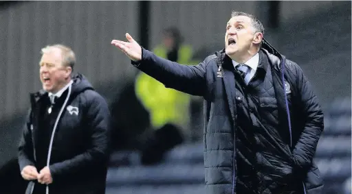  ?? Martin Rickett ?? New Rovers boss Tony Mowbray on the sidelines alongside Derby counterpar­t Steve McClaren