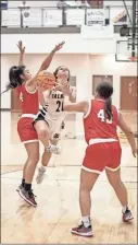  ?? Tim Godbee ?? Calhoun High School freshman guard Kat Atha, shown here releasing a shot in a crowd, has done well in her rookie year with the Lady Jackets.