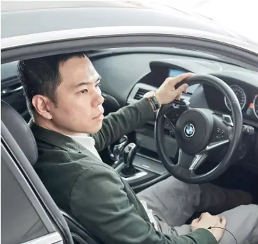  ??  ?? FULL OF DRIVE Motoring fan Alvin Soon at the wheel of his BMW 6 Series coupe.