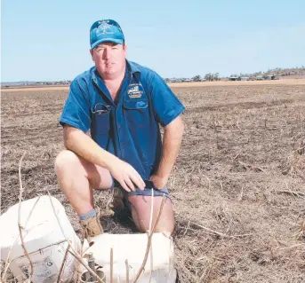  ?? Picture: Matthew Newton ?? NOT HAPPY: Kingsthorp­e farmer Tim Durre is frustrated with the Australia Rail Trail Corporatio­n over its Inland Rail plans.