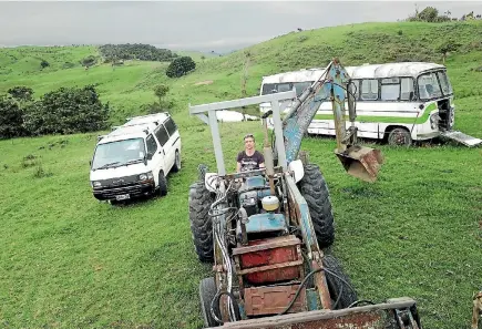  ?? PHOTOS: SUPPLIED ?? Daniel Leighton, 30, plans to convert an old bus into a home. He is also working on fixing up an old tractor to do earthworks.