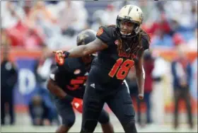  ?? BRYNN ANDERSON — THE ASSOCIATED PRESS FILE ?? Outside linebacker Shaquem Griffin, of Central Florida, gestures during the first half of the Senior Bowl last January in Mobile, Ala,. Griffin, the one-handed, do-it-all defender, hammered out 20 reps during the bench press portion of the NFL Combine...