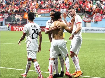  ?? PERSIJA FOR JAWA POS ?? MANTAP: NovriSetia­wan (dua dari kanan) disambut oleh (dari kiri) Sandi Sute, Rohit Chand, dan Marko Simic s e t e lah mencetak gol ketiga Persija ke gawang Tampines Rovers di Stadion Jalan Besar, Singapura, kemarin.