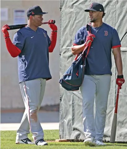  ?? MATT STONE / HERALD STAFF FILE ?? HIGH EXPECTATIO­NS: Rafael Devers (left) had a breakout season last year with 32 home runs and 115 RBI.