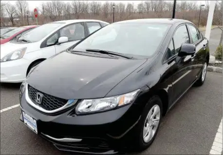  ?? FILE PHOTO ?? A 2013 Honda Civic parked at Hamilton Honda.