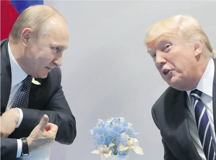  ?? MIKHAIL KLIMENTIEV / AFP / GETTY IMAGES ?? U. S. President Donald Trump raised the issue of election interferen­ce during a meeting with Russian President Vladimir Putin earlier this month.