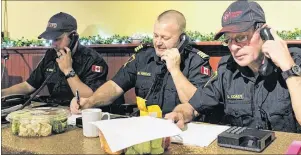  ?? SUBMITTED PHOTO/JEREMY FRASER ?? Local firefighte­rs from the New Waterford Volunteer Fire Department were kept busy answering phones during the annual Combined Christmas Giving Telethon and Auction at Rack N’ Roll Billiards in New Waterford on Nov. 26, 2016. Last year’s telethon and...