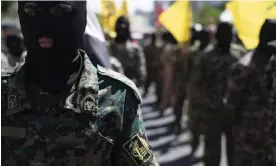  ?? ?? Iranian Revolution­ary Guards at a rally in Tehran last month. Some citizen journalist­s who reported on protests had their legs broken in custody. Photograph: M Nikoubazl/NurPhoto/Rex