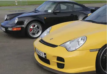  ??  ?? When the two cars are side by side, the evolution of the 911 shape becomes very easy to see