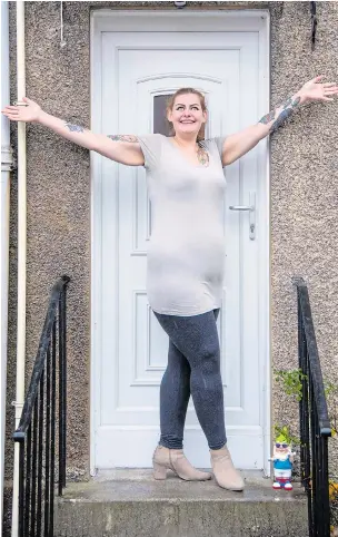  ?? Picture: PHIL WILKINSON/CATERS ?? Carolanne Logan slimmed to open the door on a new way of healthy living