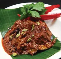  ??  ?? You’ll love Capital Cafe’s fiery beef rendang, which features melt-in-the-mouth beef doused in a rich rendang gravy.