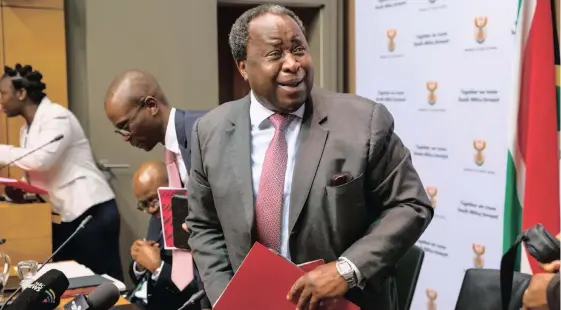  ??  ?? TITO MBOWENI, South Africa’s finance minister, arrives for a news conference before he presents his budget to Parliament in Cape Town. | DWAYNE SENIOR Bloomberg