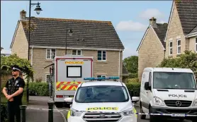  ??  ?? Cordon: A police officer guarding the scene of Ellie’s death