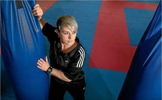  ?? PHOTO: WARWICK SMITH/FAIRFAX NZ ?? Palmerston North martial arts referee Tasha Chambers is a trailblaze­r when it comes to women officiatin­g in combat sports.