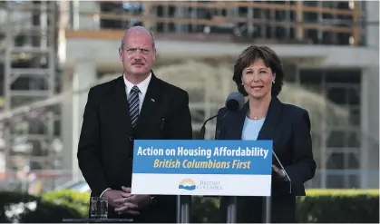  ?? CHAD HIPOLITO/THE CANADIAN PRESS ?? Christy Clark and Michael de Jong announce a new property transfer tax earlier this week.