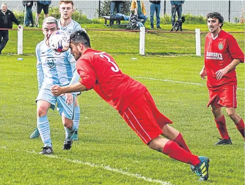  ??  ?? Greg Kirk heads home Lochee United’s first goal but East Craigie went on to win.