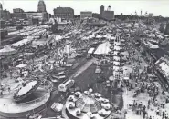  ?? JOURNAL SENTINEL FILES ?? Thousands of people pack the Summerfest grounds in 1970. After being held in locations around the city its first two years, the music festival centralize­d activities at a former missile site along the lakefront in 1970.