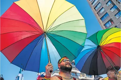  ?? Picture: AFP ?? RAINBOW PEOPLE. Revellers take part in the Pride Parade in Santiago, Chile, on Saturday.