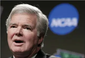  ?? ASSOCIATED PRESS FILE PHOTO ?? President Mark Emmert answers questions during a 2019 news conference at the Final Four college basketball tournament in Minneapoli­s.