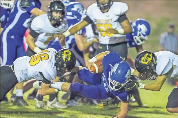  ?? Steven Eckhoff, File ?? Armuchee junior Kameron Parker scores a touchdown against Cherokee County (Ala.) High School during a game last season. Parker, a senior, will be heavily counted on this season for the Indians.