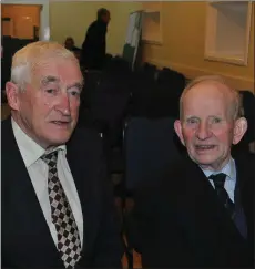  ??  ?? Pat Nolan and John Devereux whose uncles played on the team. John was the oldest recipient of a commemorat­ive presentati­on at the age of 92.