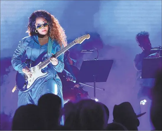  ?? Richard Shotwell Invision / AP ?? H.E.R. (real name: Gabi Wilson) stole the show at this year’s BET Awards. The R&amp;B performer is up for five Grammys, including new artist and album of the year.