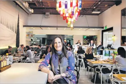  ?? Photograph­s by Jay L. Clendenin Los Angeles Times ?? AKASHA RICHMOND relaxes in her Italian restaurant, AR Cucina, in Culver City. Until recently, it was her Indian restaurant.