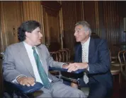  ?? J. SCOTT APPLEWHITE — THE ASSOCIATED PRESS ?? Marc Buoniconti, left, and his father, former Dolphins player Nick Buoniconti, speak after Marc received the American Institute for Public Service Jefferson Award at the Supreme Court in Washington on June 28, 1989.