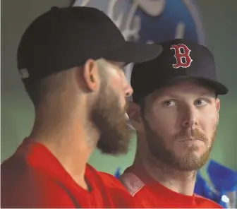  ?? STAFF PHOTO BY CHRISTOPHE­R EVANS; AP PHOTOS (BELOW) ?? DOESN’T SIT WELL: Chris Sale listens to fellow Red Sox starter Rick Porcello in the dugout earlier this week at Fenway. Sale, who is on the disabled list, will not be in action this weekend against his former team, the White Sox.