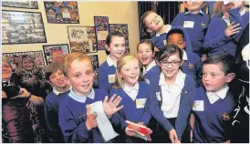  ?? by Grant Humphreys www.buyaphotot­ms.co.uk ?? ■ ‘AMAZING DAY’: Children enjoyed the opening of their new school libraryPho­to