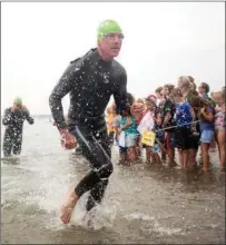  ?? Submitted photo ?? Cumberland native Ron Gillooly, 57, competed in his 25th Save The Bay swim Saturday afternoon.