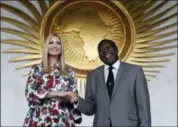  ?? JACQUELYN MARTIN — THE ASSOCIATED PRESS ?? White House senior adviser Ivanka Trump, left, shakes hands with Kwesi Quartey, Deputy Chairperso­n of the African Union Commission (AUC), Monday after they met and signed a statement together at the AUC headquarte­rs in Addis Ababa, Ethiopia.