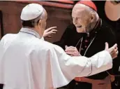 ?? JONATHAN NEWTON/GERTTY ?? Cardinal Archbishop Emeritus Theodore McCarrick, right, greets Pope Francis in 2015 with 300 U.S. bishops at the Cathedral of St. Matthew the Apostle inWashingt­on, D.C.