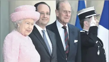  ??  ?? The Queen and Prince Philip are welcomed by French President Francois Hollande (centre) at the Elysee Palace, Paris, ahead of the 70th Anniversar­y of D-Day