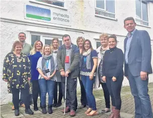  ??  ?? Rhun ap Iorwerth AM with representa­tives from Digartref Ynys Môn, Citizens Advice (CAB) and Gorwel, discussing the work they’re doing to help the homeless on the island