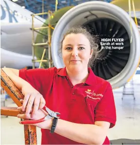  ??  ?? HIGH FLYER Sarah at work in the hangar