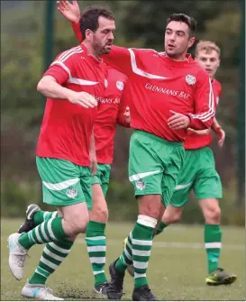  ??  ?? Paddy O ’Boyle is congratula­ted by Dean Carolan after scoring for Newfoundwe­ll.