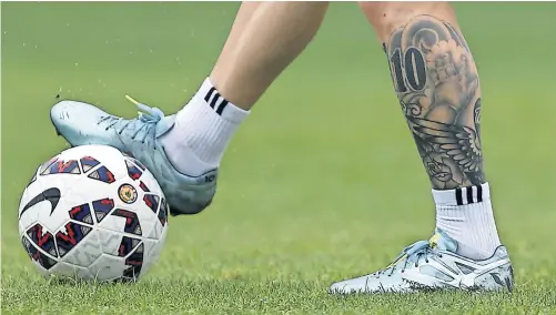  ?? Picture: Reuters ?? INKED. A tattoo is seen on the leg of Argentina’s Lionel Messi during a training session in La Serena this week ahead of their Copa America quarterfin­al against Colombia on Friday.