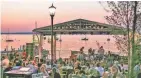  ?? WISCONSIN UNION ?? Enjoy an autumn sunset on the Memorial Union Terrace in Madison.