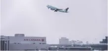  ?? PETER J THOMPSON / NATIONAL POST ?? A flight takes off from Toronto Pearson Internatio­nal Airport,
which is by far Canada's busiest air hub, on Tuesday.