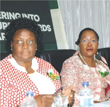  ?? — Picture by Memory Mangombe ?? Labour and Social Welfare permanent secretary Judith Katerera (right) and acting board chairman Priscilla Mujuru follow proceeding­s NSSA during the 2019 Engineers Workshop on Occupation­al Safety and Health in Harare yesterday.